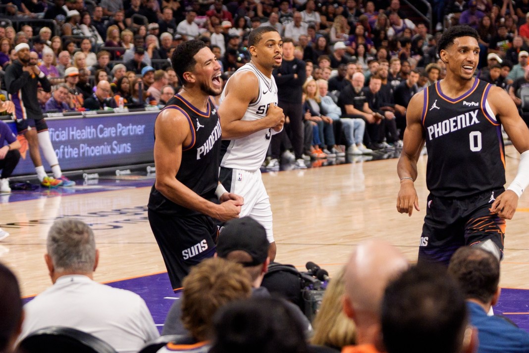NBA: San Antonio Spurs at Phoenix Suns Suns star Devin Booker reacts to a play against the Spurs during the 2025-26 NBA season.