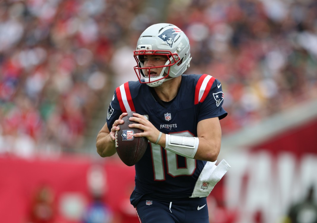 Patriots quarterback Drake Maye looks to throw against the Buccaneers during the 2025 NFL season.