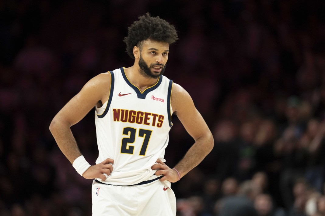 Nuggets star Jamal Murray looks on against the Timberwolves during the 2025-26 NBA season.