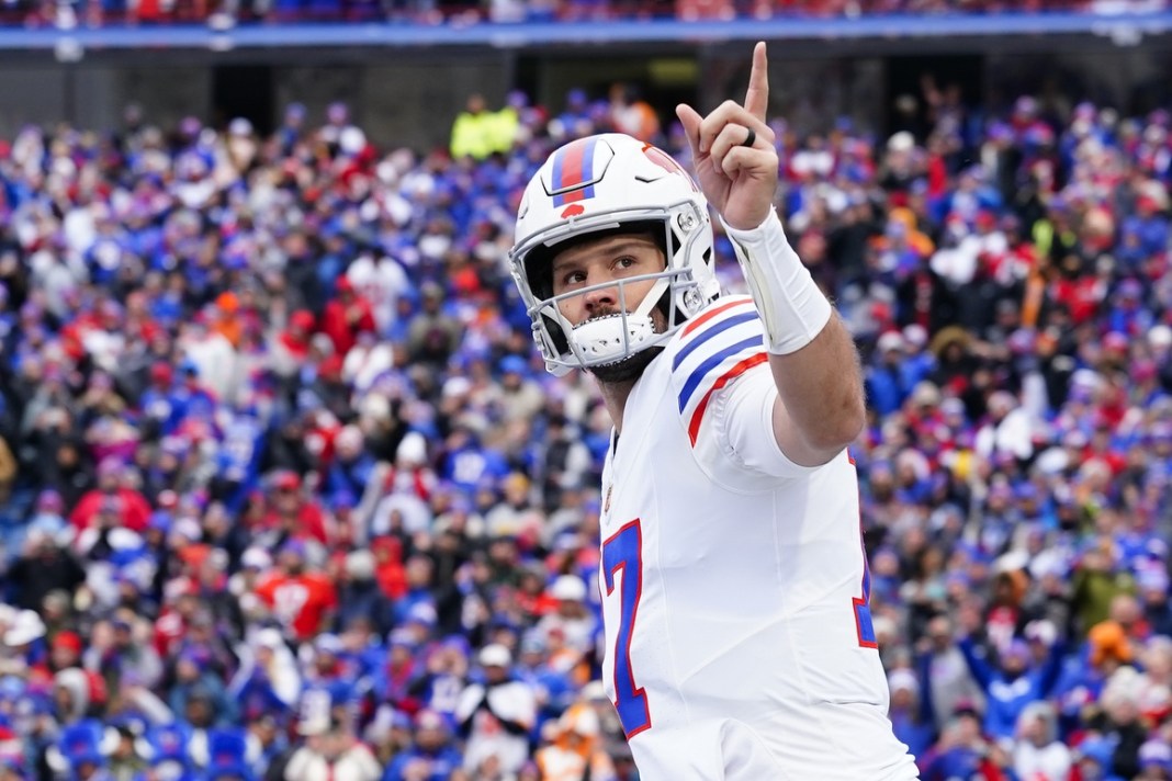 Bills star Josh Allen points to the crowd during a meeting with the Buccaneers in the 2025 NFL season.