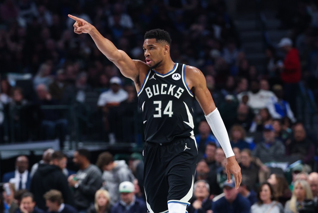 NBA: Milwaukee Bucks at Dallas Mavericks Bucks superstar Giannis Antetokounmpo points against the Mavericks during the 2025-26 NBA season.