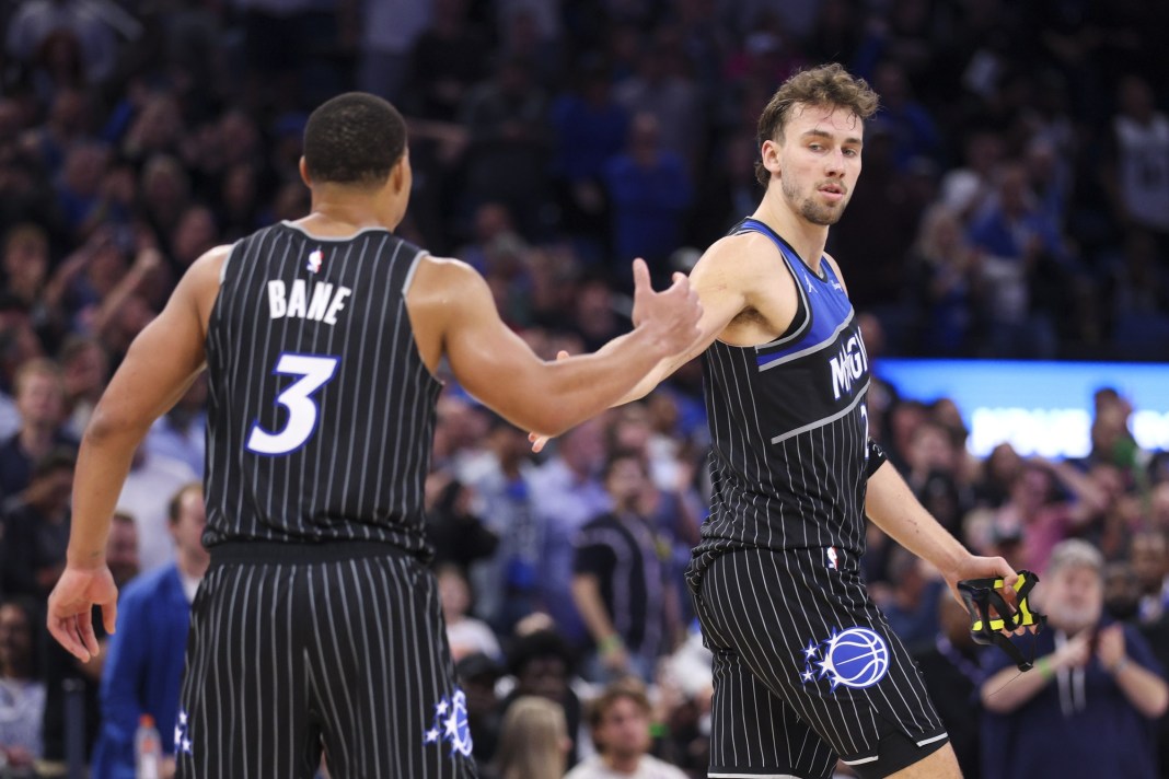 Magic stars Franz Wagner and Desmond Bane high five during a game against the Spurs in the 2025-26 NBA season.
